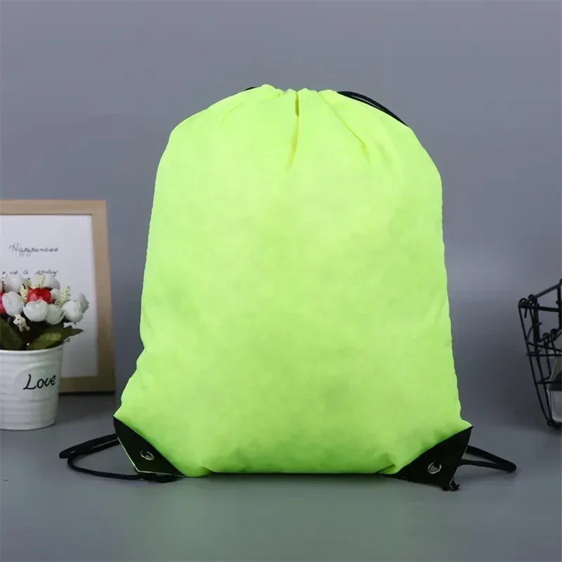 Valour Fit gym storage backpack with multiple pockets, black gym bag for organizing workout gear and essentials.