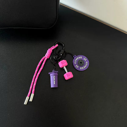 Valour Fit fitness keychain with D-shaped clip for gym bags, durable accessory for fitness enthusiasts and gym gear.