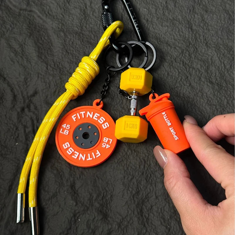 Valour Fit fitness keychain with D-shaped clip for gym bags, durable fitness accessories for secure attachment.
