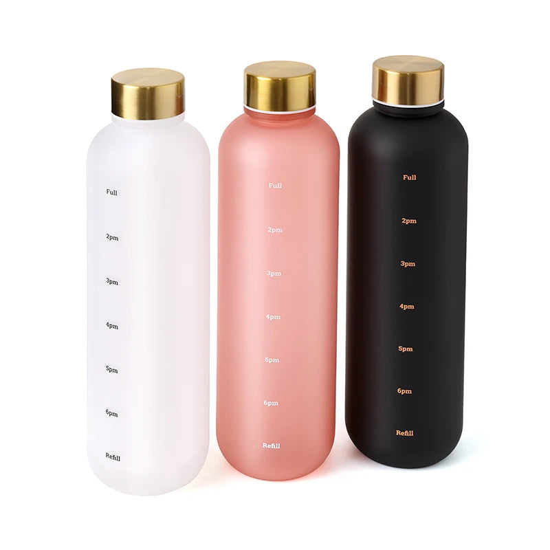 Valour Fit 1L motivational water bottle with time marker, clear plastic with grip handle and measurement markings.
