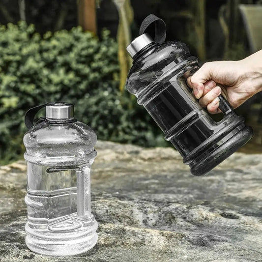 Valour Fit 2L PETG gym water bottle with carry handle showing a clear, durable plastic design for fitness and hydration.