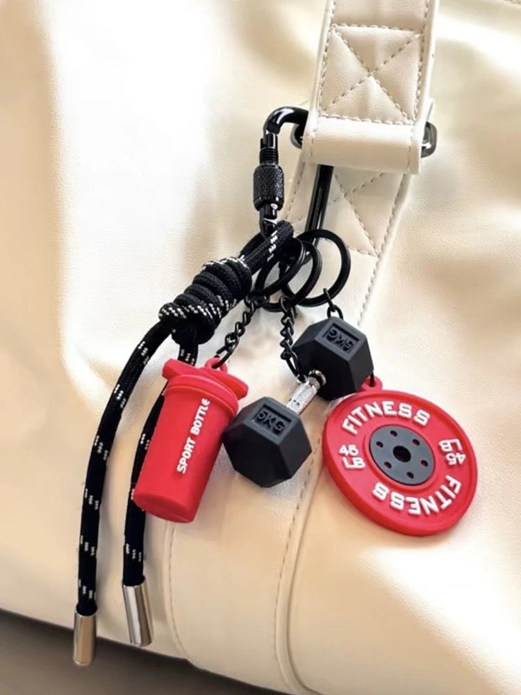Valour Fit fitness keychain with D-shaped clip for gym bags, durable accessories for workout gear.