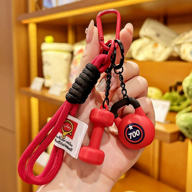 Valour Fit fitness keychain with D-shaped clip for gym bags, durable fitness accessories for secure attachment.