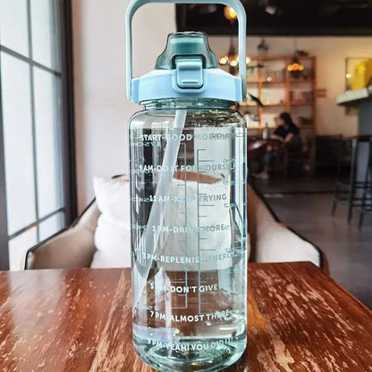 Valour Fit 2L motivational sports water bottle with time marker and ergonomic design for hydration tracking during workouts.
