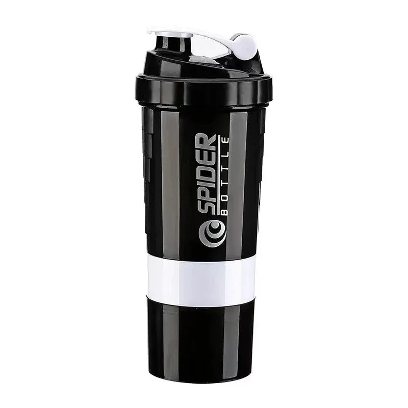 Valour Fit 500ml protein shaker bottle with powder storage, black plastic bottle with twist cap and integrated mixing ball.