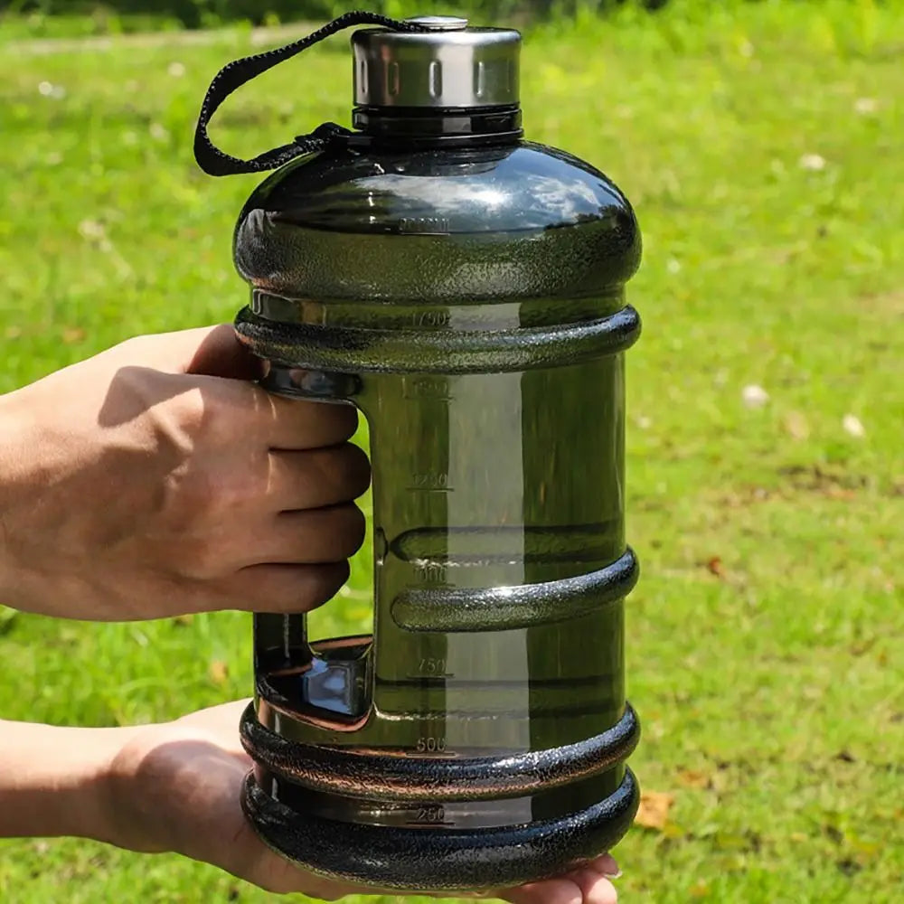 Valour Fit 2L PETG gym water bottle with carry handle, transparent design and ergonomic spout for easy hydration.