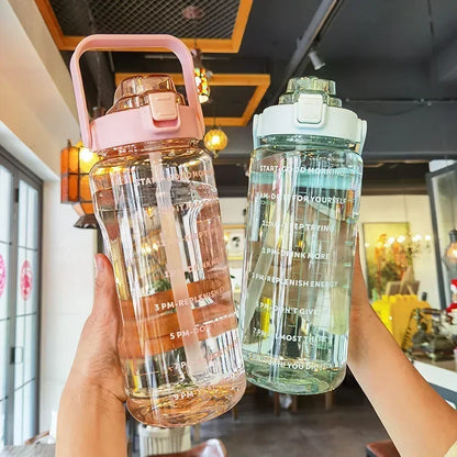 Valour Fit 2L straw water bottle with time marker showing clear measurement and flip straw lid for easy hydration.