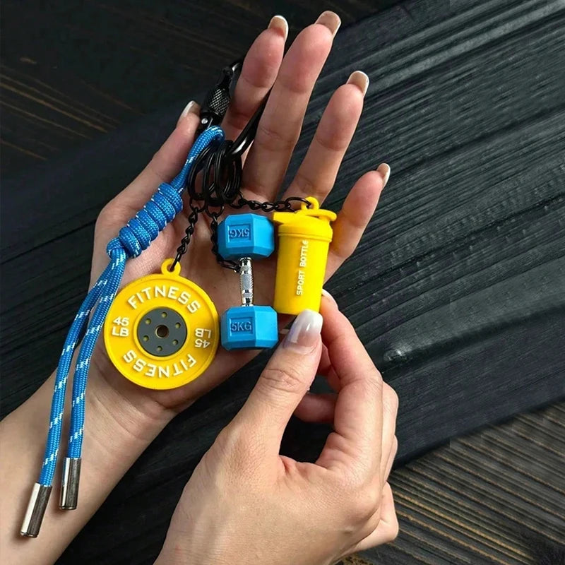 Valour Fit fitness keychain with D-shaped clip for gym bags, durable and lightweight fitness accessories for workout gear.