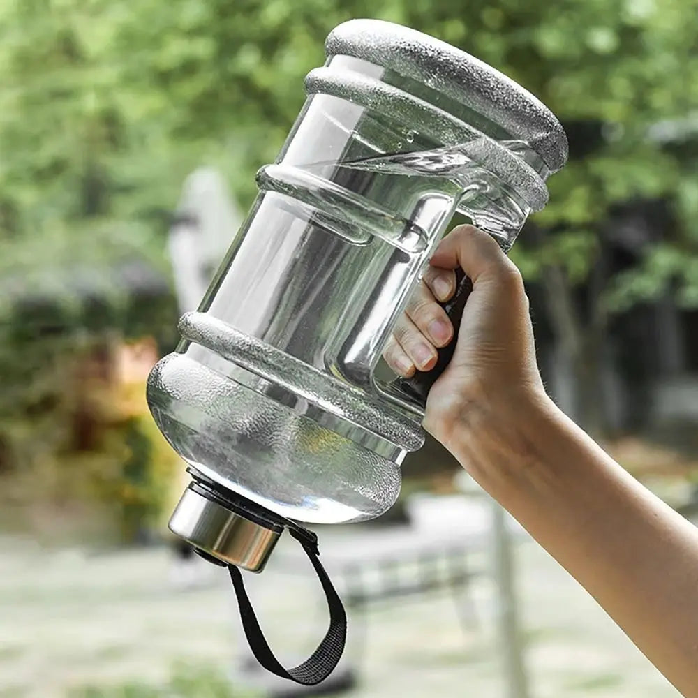 Valour Fit 2L PETG gym water bottle with a carry handle, clear plastic design for easy hydration during workouts.