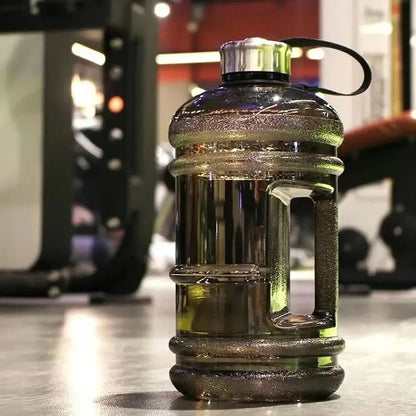 Valour Fit 2L PETG gym water bottle with carry handle, clear plastic design for workout hydration.