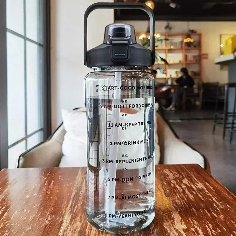 Valour Fit 2L motivational sports water bottle with time marker and leak-proof lid for hydration during workouts.