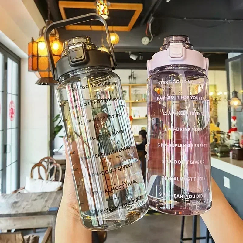 Valour Fit 2L motivational sports water bottle with time marker, clear plastic container for hydration and fitness activities