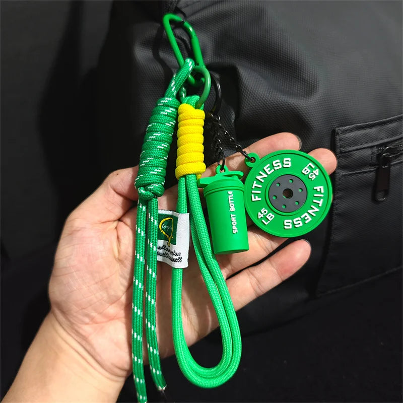 Valour Fit fitness keychain with D-shaped clip, ideal for gym bags and fitness accessories, in black and silver.