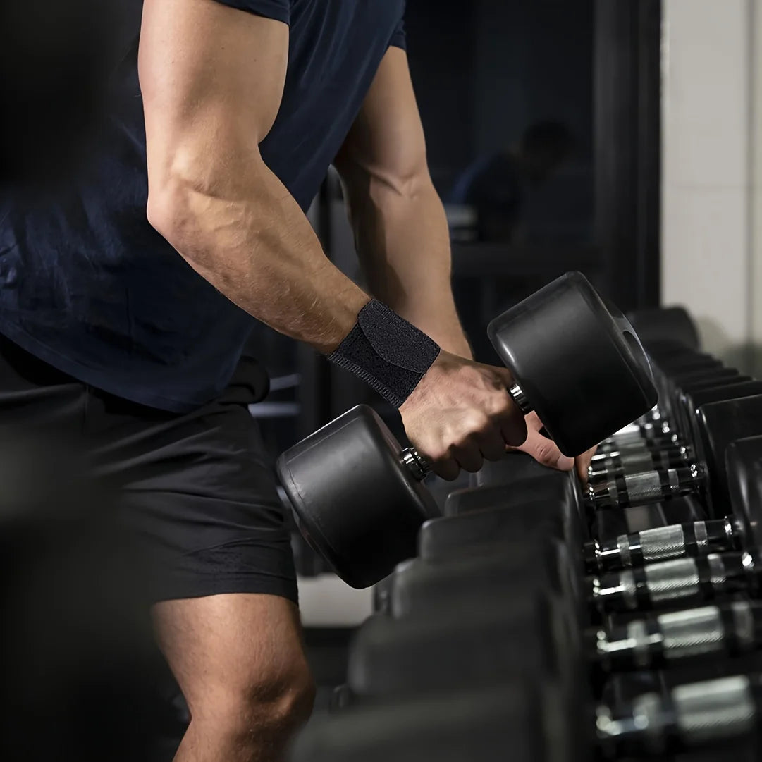 Valour Fit 2-piece adjustable wrist support straps, showing black wrist wraps with Velcro closures for added wrist stability.